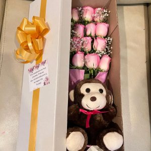 Caja por 12 rosas con peluche
